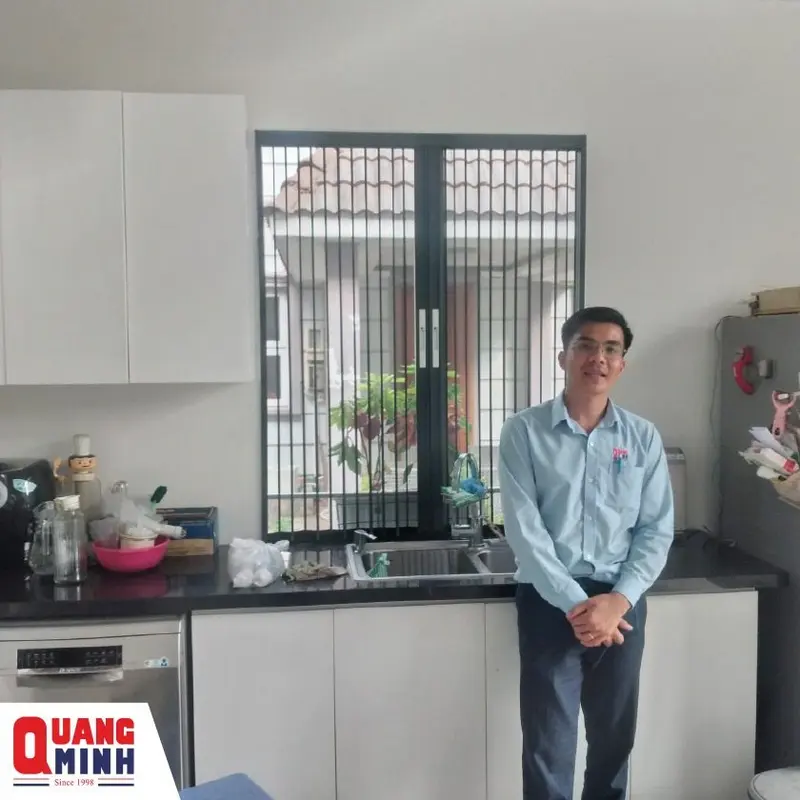 Cửa xếp lá nhôm Quang Minh cửa sổ